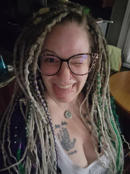 Girl with Blond Dreads and Tattoo